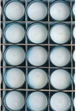 VOTIVE CANDLE IN GLASS TURQUOISE PKG/25